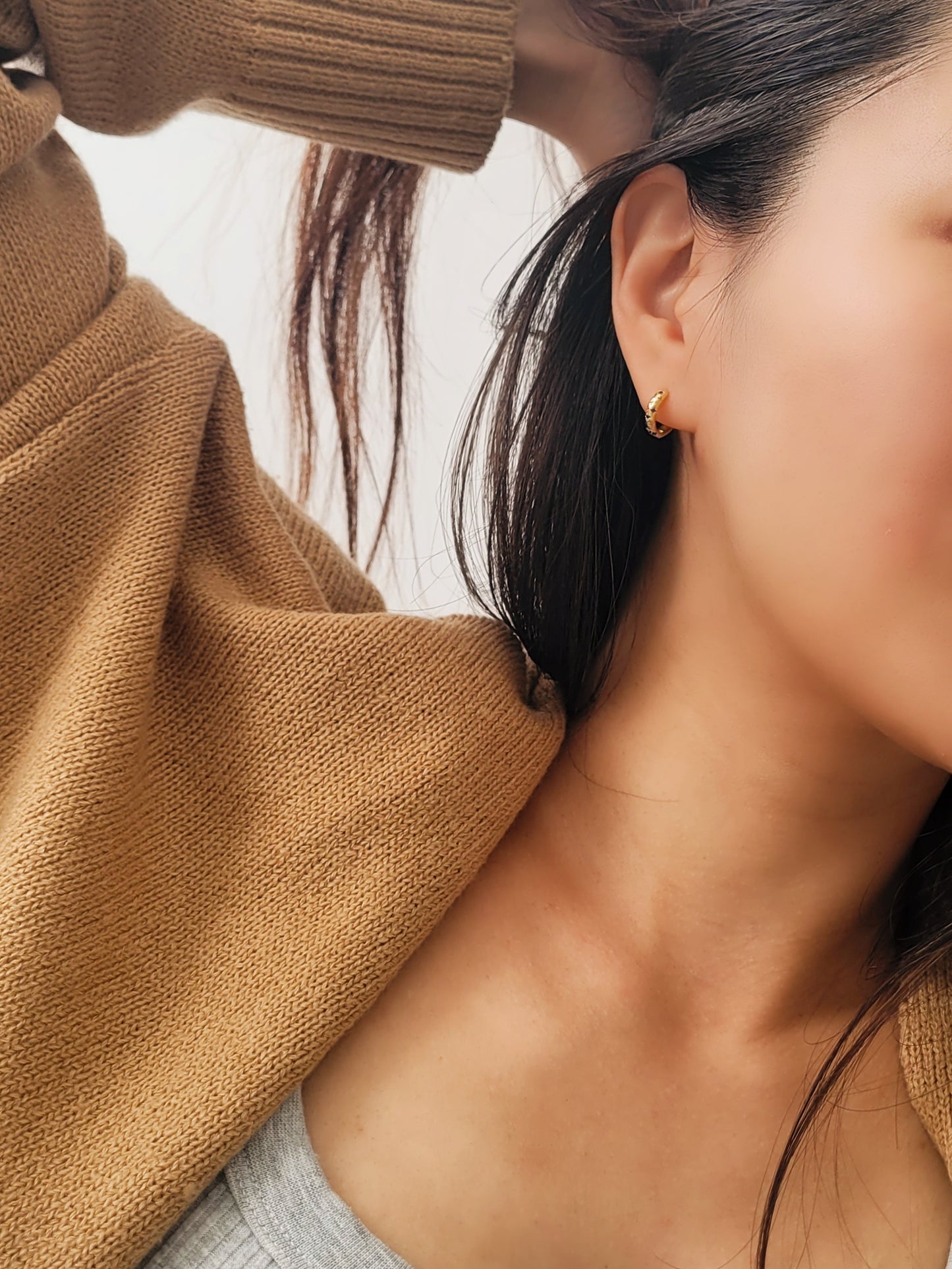 model wearing blue star huggie earrings in casual wear style, perfect gift for birthday