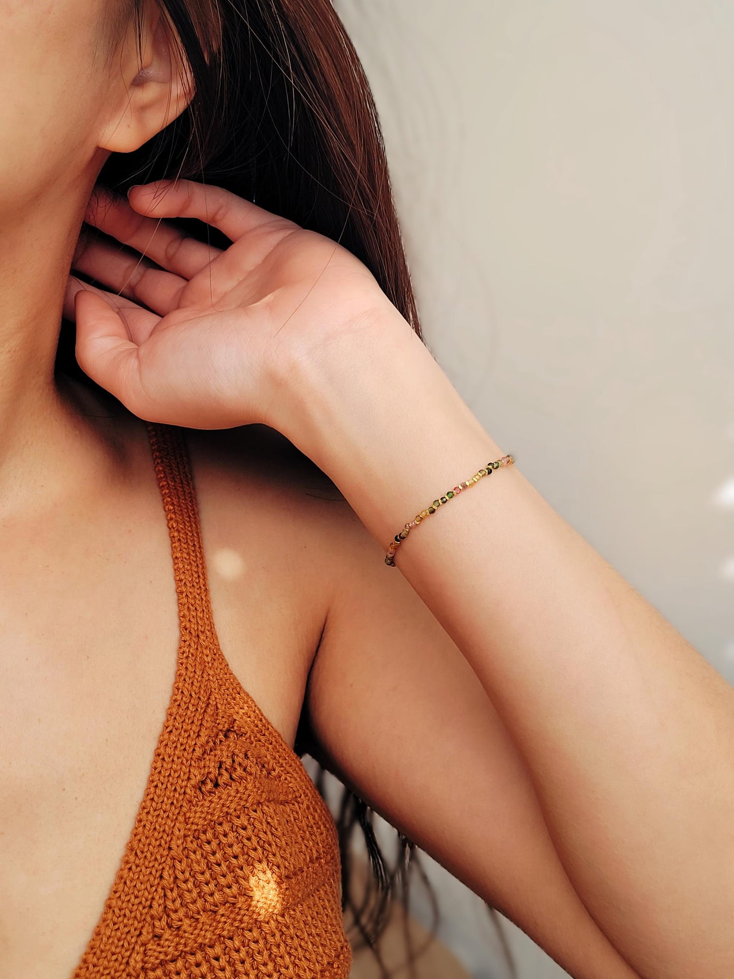 A minimalist gold bracelet with colorful tourmaline gemstone beads and gold plated beads, perfect for layering and stacking. Idea birthday gift for her.