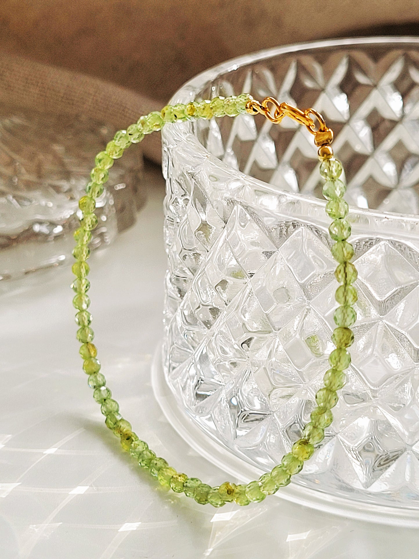 Natural peridot bracelet shown in natural lighting