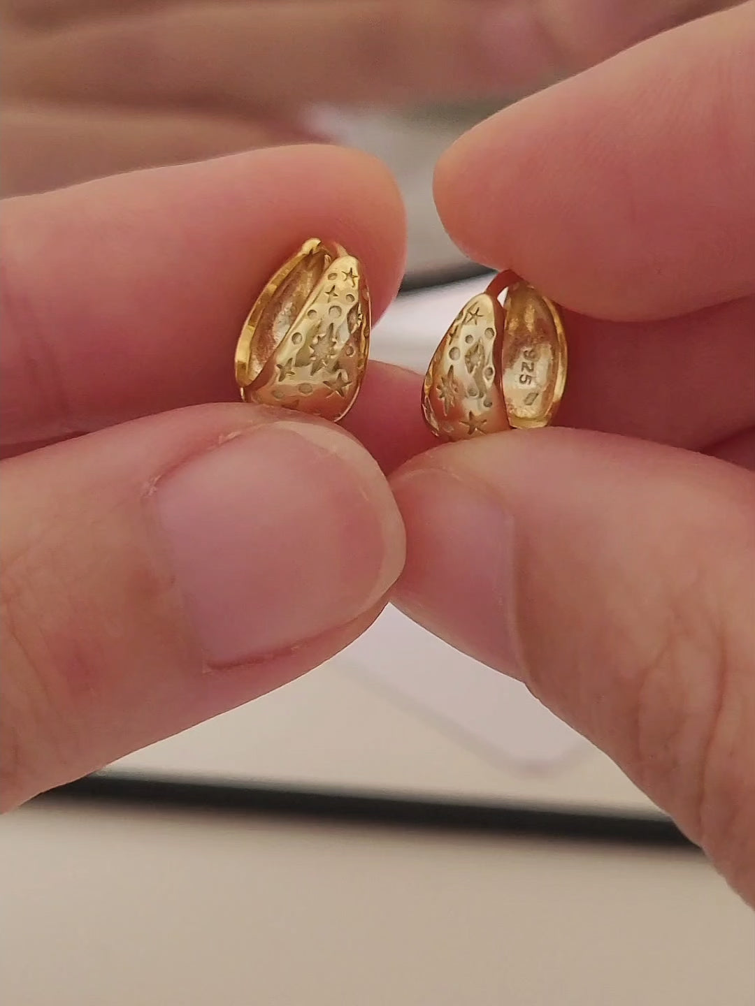 A pair of star huggie hoop earrings crafted in 18k gold plated sterling silver, perfect christmas gift for her