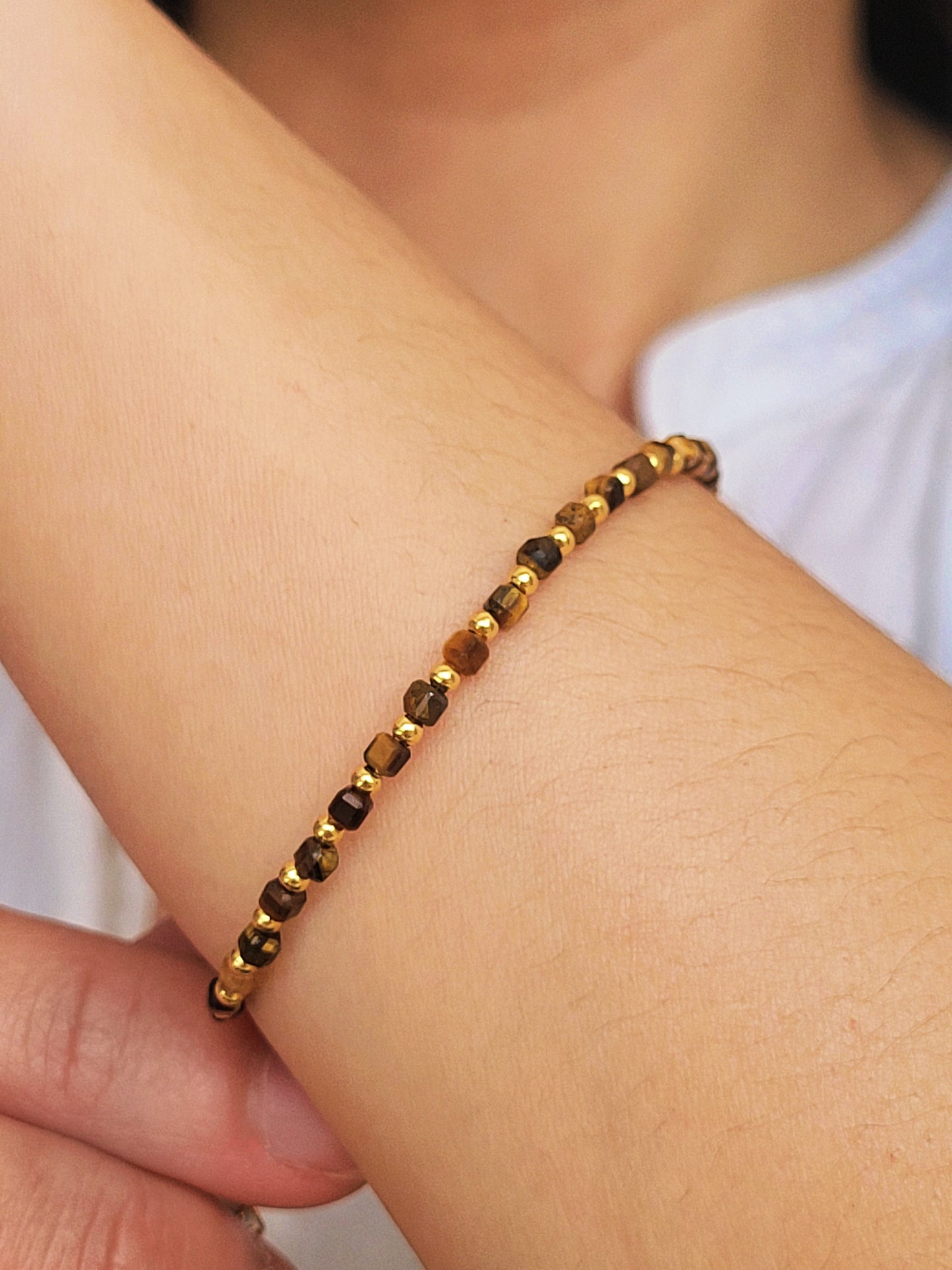 Dainty Tiger’s Eye bracelet with gold vermeil beads on wrist