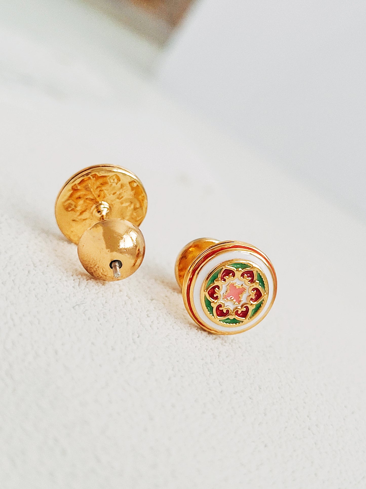 Gold-plated enamel stud earrings with vintage-inspired floral design in pink, green, and red, styled after classic Victorian ceramic tiles.