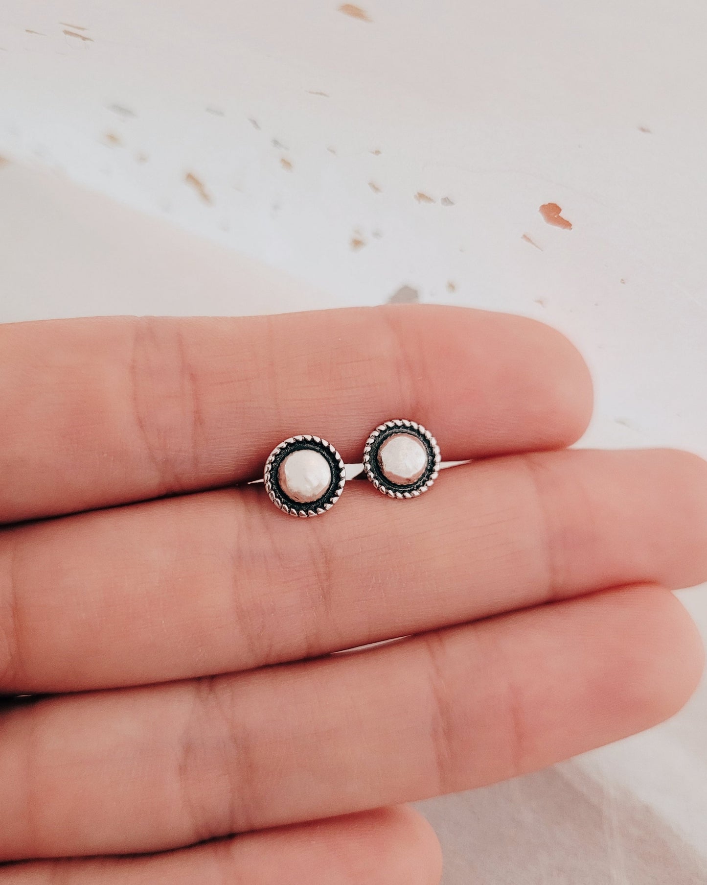 button earrings