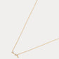 A dainty gold necklace with a pendant featuring a stylized Aries zodiac constellation sign with sparkling zircons. Best birthday gift for her.