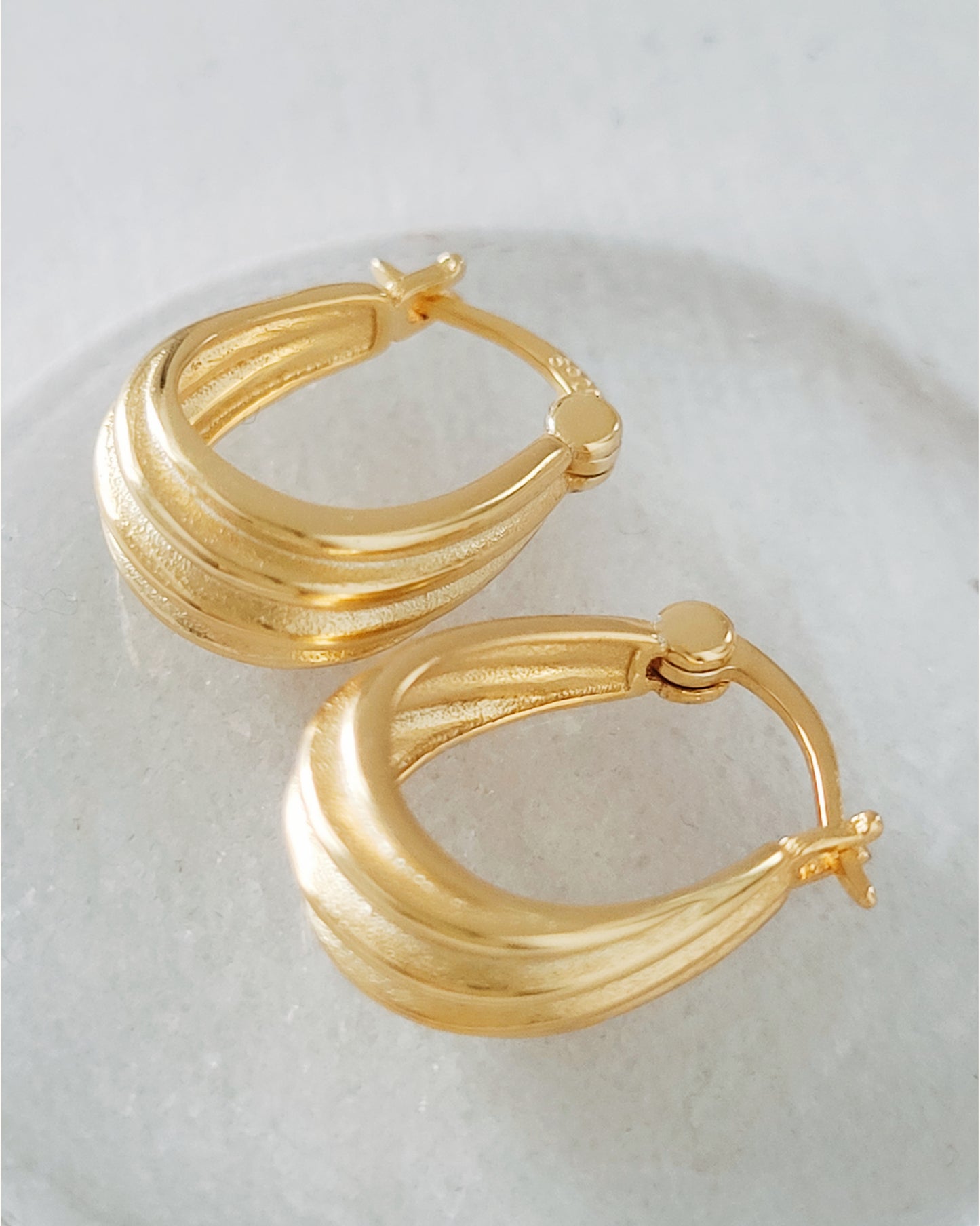 twist hoop earrings