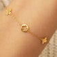 A dainty gold bracelet featuring van cleef clover motif, crafted in gold plated sterling silver.