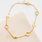 A dainty gold bracelet featuring van cleef clover motif, crafted in gold plated sterling silver.