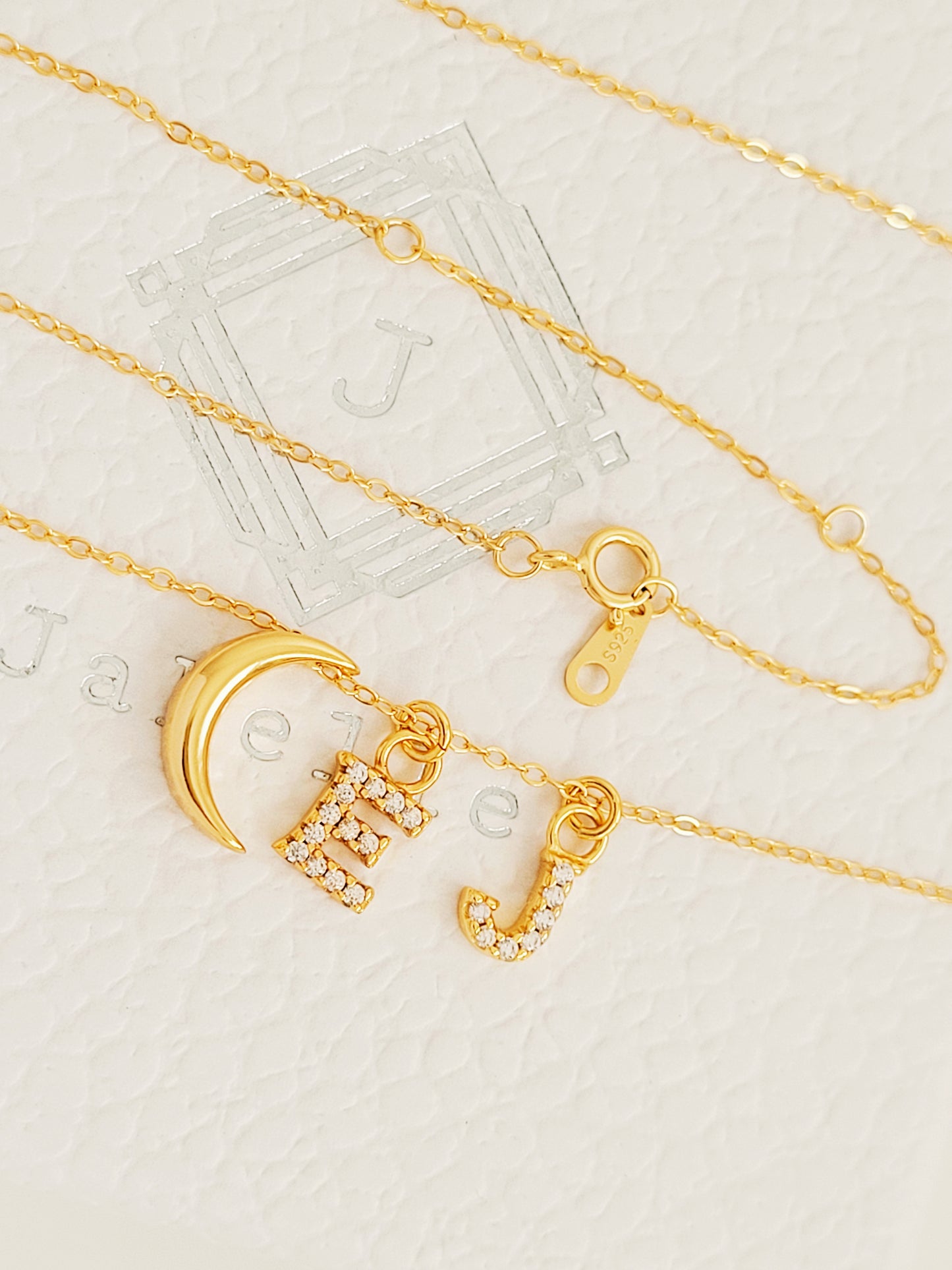 Personalised gold plated crescent initial charm necklace. Crafted in 18k gold vermeil, best valentines day gift for her.