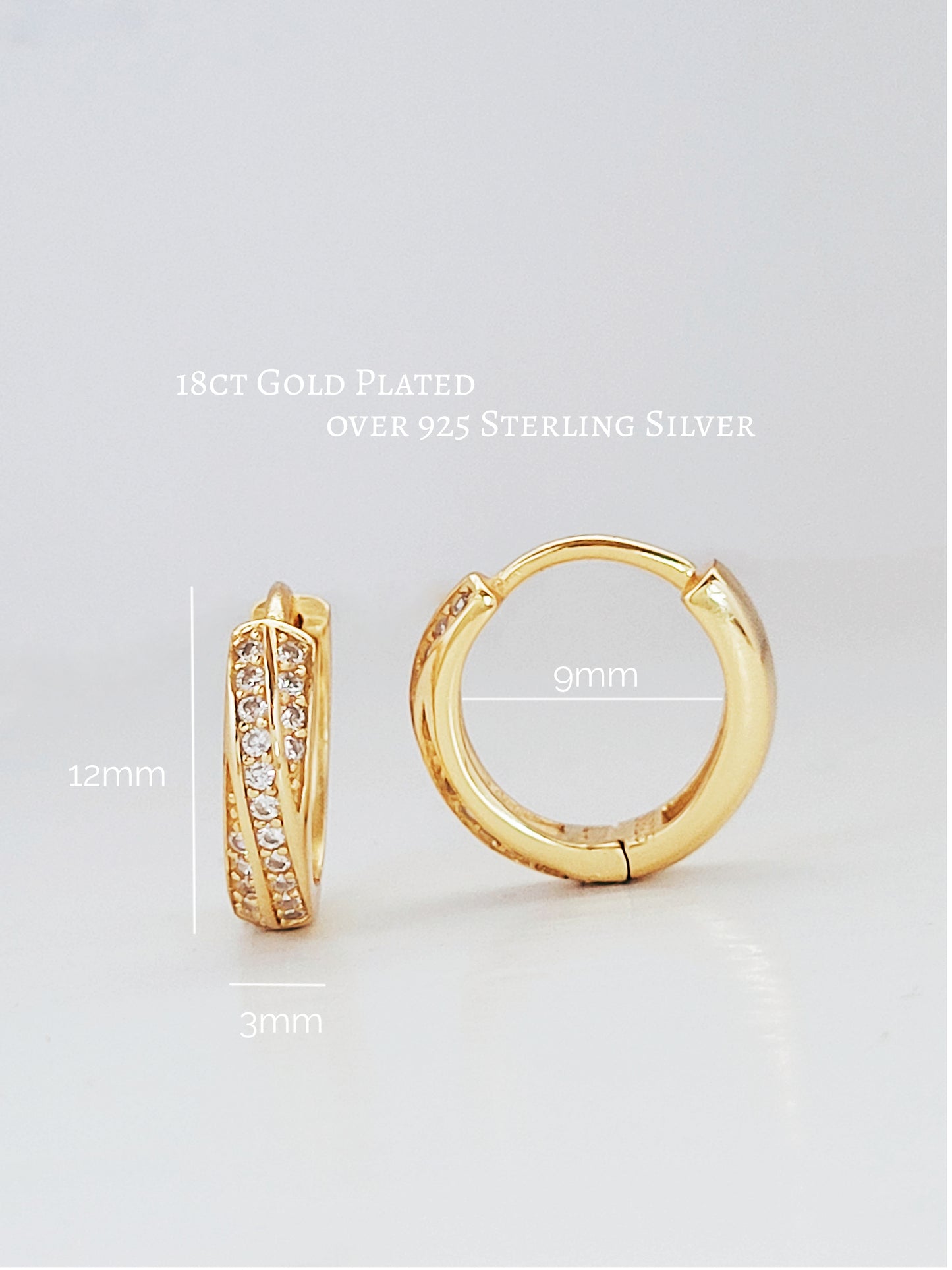 The golden hue and the sparkle of the stones make these gold crisscross huggie hoop earrings stand out, while their small size keeps them elegant and subtle.