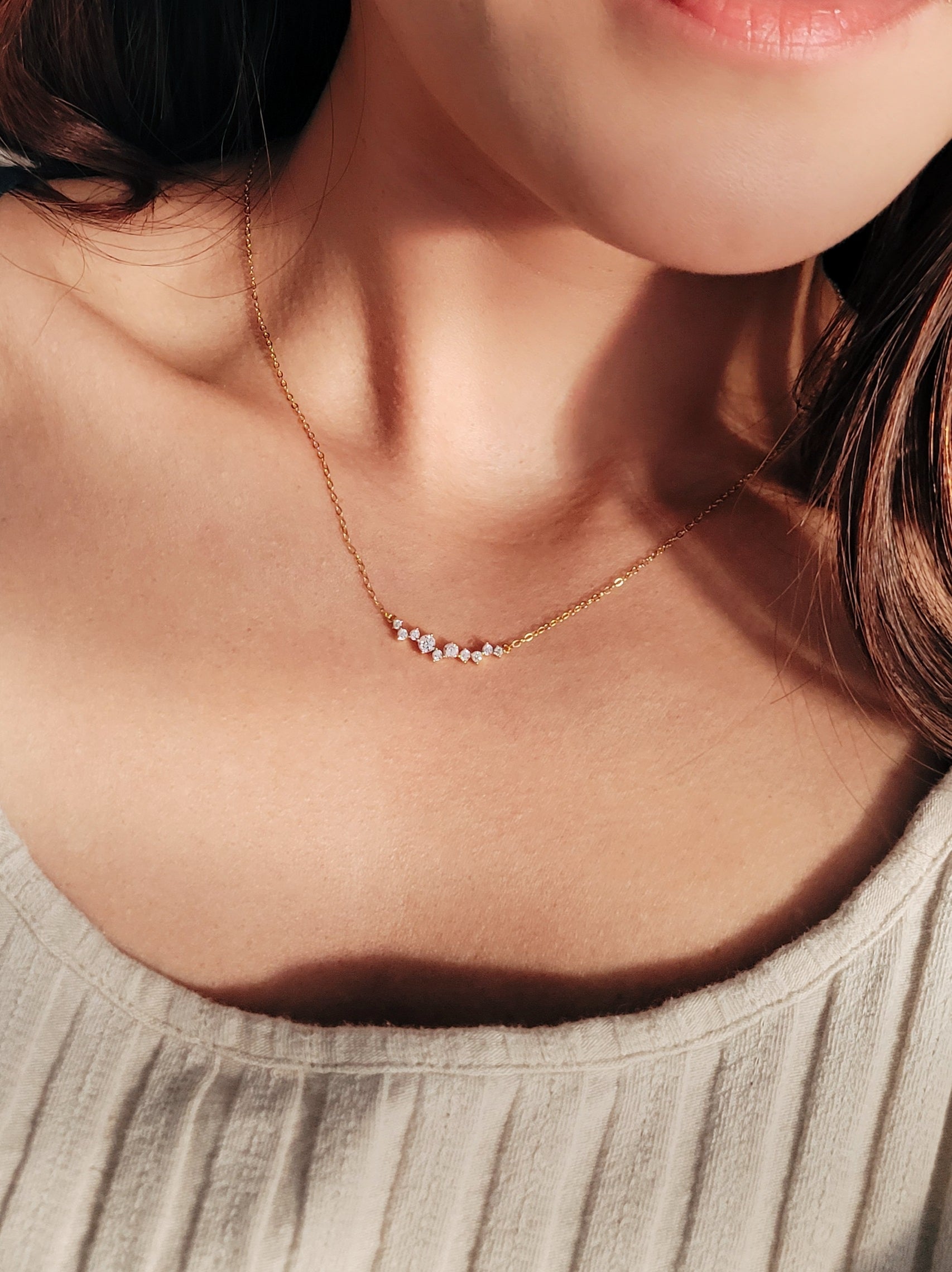 Delicate gold-plated chain with zirconia accents, a versatile and stylish gift for her.