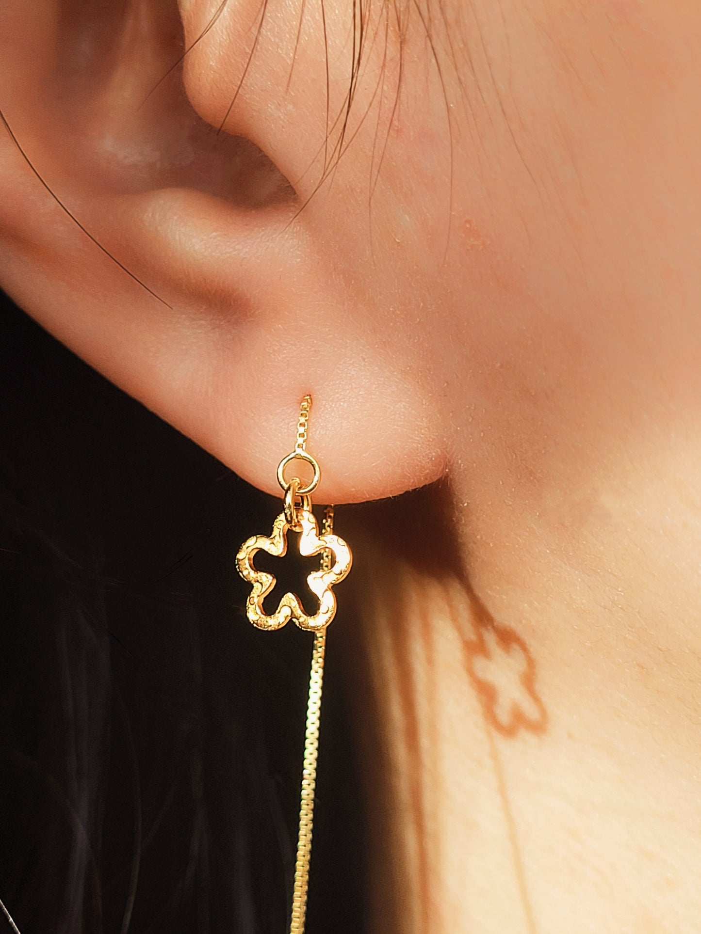 Dainty gold threader earrings with floral charm, lightweight minimalist drop earrings for everyday wear.
