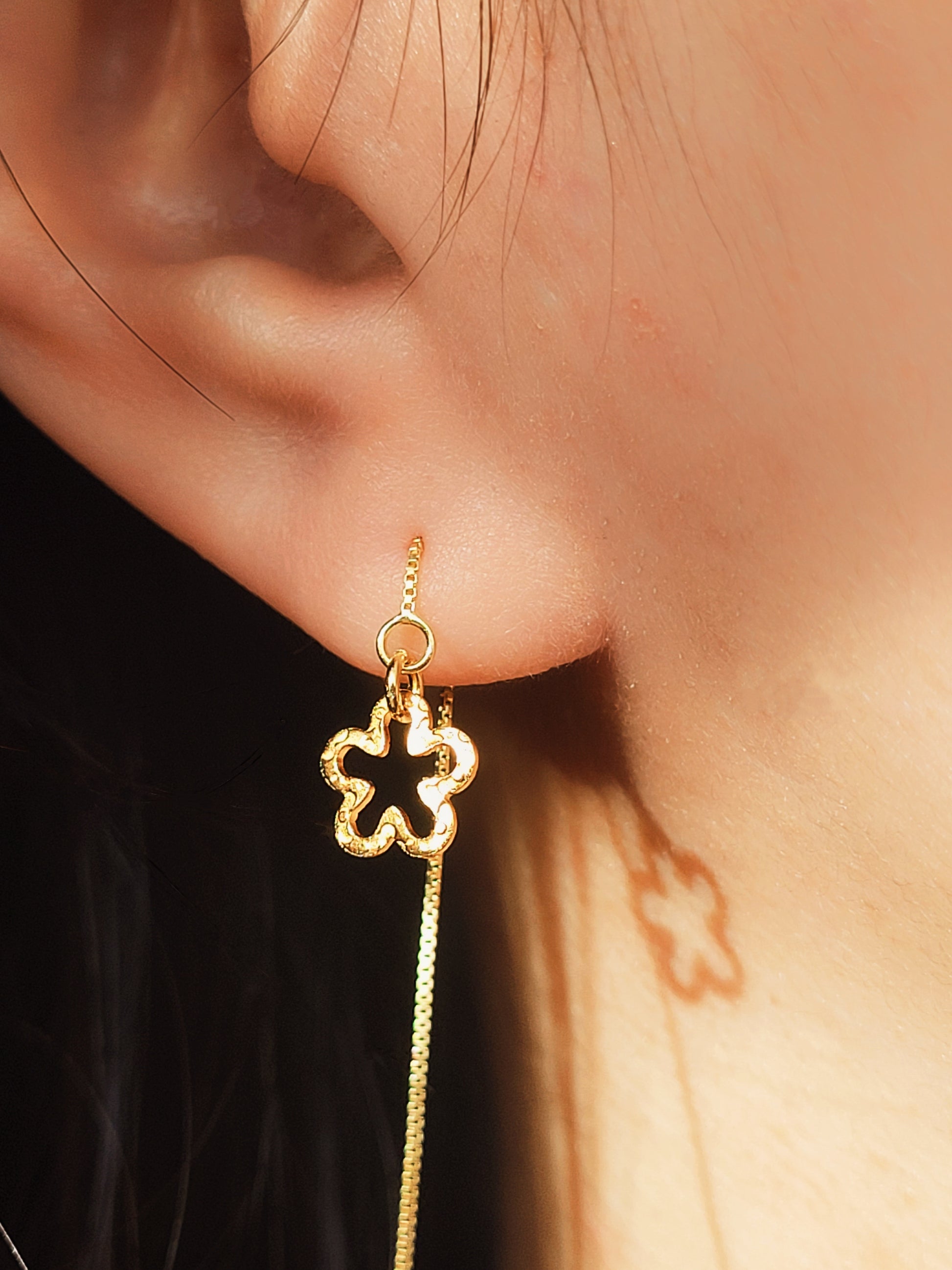 Dainty gold threader earrings with floral charm, lightweight minimalist drop earrings for everyday wear.