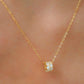 Luxurious close-up of a gold round shaped barrel necklace featuring sparkling pave zircons.