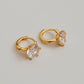 Stylish and dainty solitaire cubic zirconia earrings in gold vermeil finish, ideal for gifting.