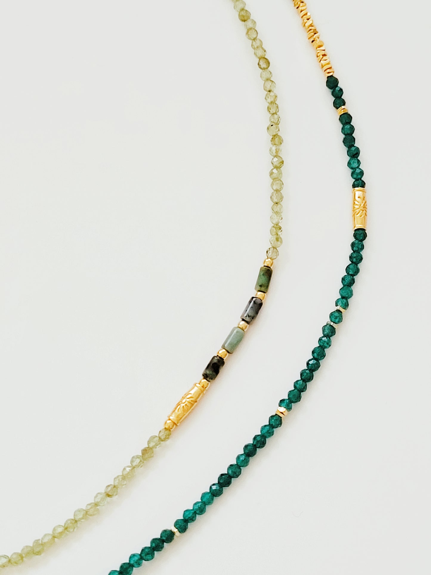 A close-up of a Green Onyx Beaded Necklace with 18k Gold Vermeil beads, showcasing an elegant minimalist design perfect for everyday wear or special occasions.