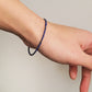 A minimalist gemstone bracelet featuring high-quality 2mm royal blue Lapis Lazuli beads paired with 18k gold vermeil accents, creating a delicate and timeless design perfect for stacking or wearing alone.