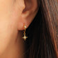 A woman wearing gold plated sterling silver star earrings, jewellery gift for her