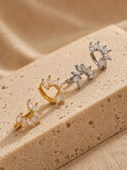 Set of dainty floral huggie hoop earrings crafted in gold plated sterling silver featuring flower shaped arrangement of a pile of marquise cubic zirconia stone, elegant and edgy jewellery