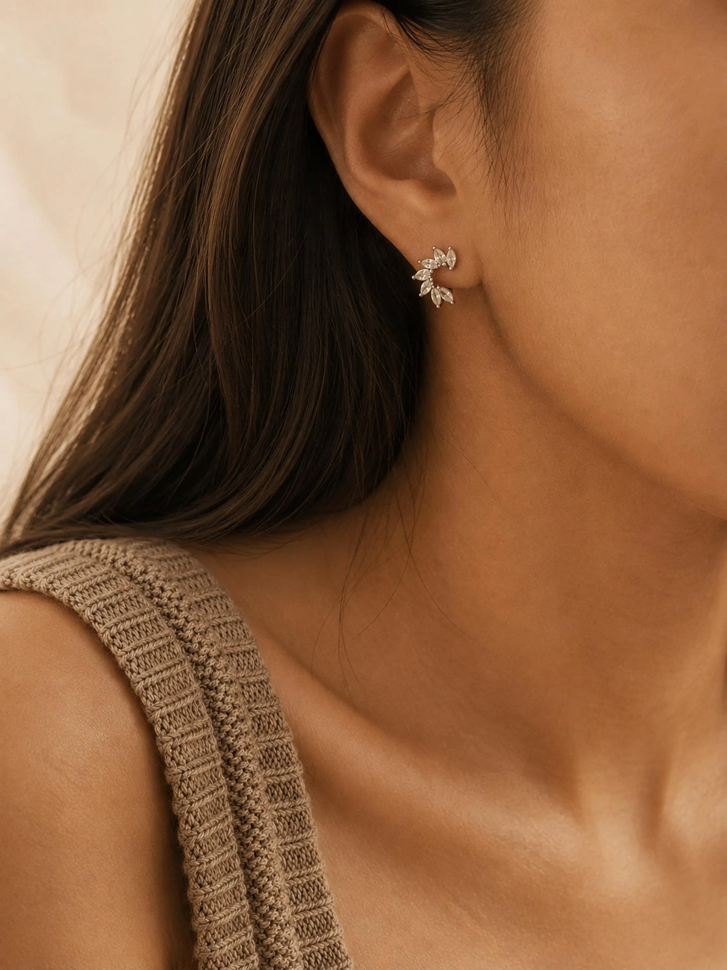 Petal marquise huggie earrings worn on a woman, floral crystal hoop earrings in sterling silver, dainty jewellery gift for bridesmaid
