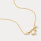 A dainty gold necklace with a pendant featuring a stylized Pisces zodiac constellation sign with sparkling zircons, thoughtful jewellery gift for her.