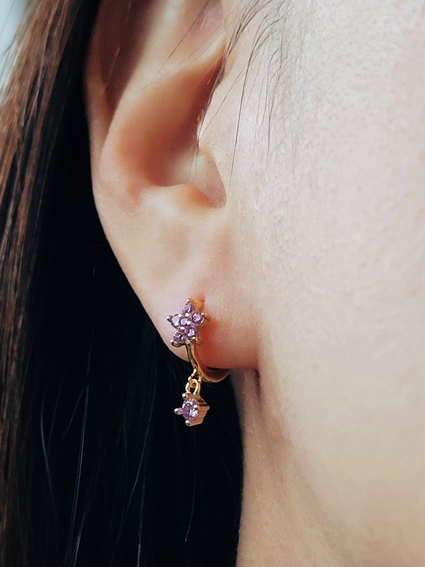 Elegant gold-plated huggie hoop earrings featuring purple flowers and delicate dangling charm, crafted in 18k gold plated sterling silver. Best valentines day gift for her.