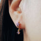 Elegant gold-plated huggie hoop earrings featuring purple flowers and delicate dangling charm, crafted in 18k gold plated sterling silver. Best valentines day gift for her.