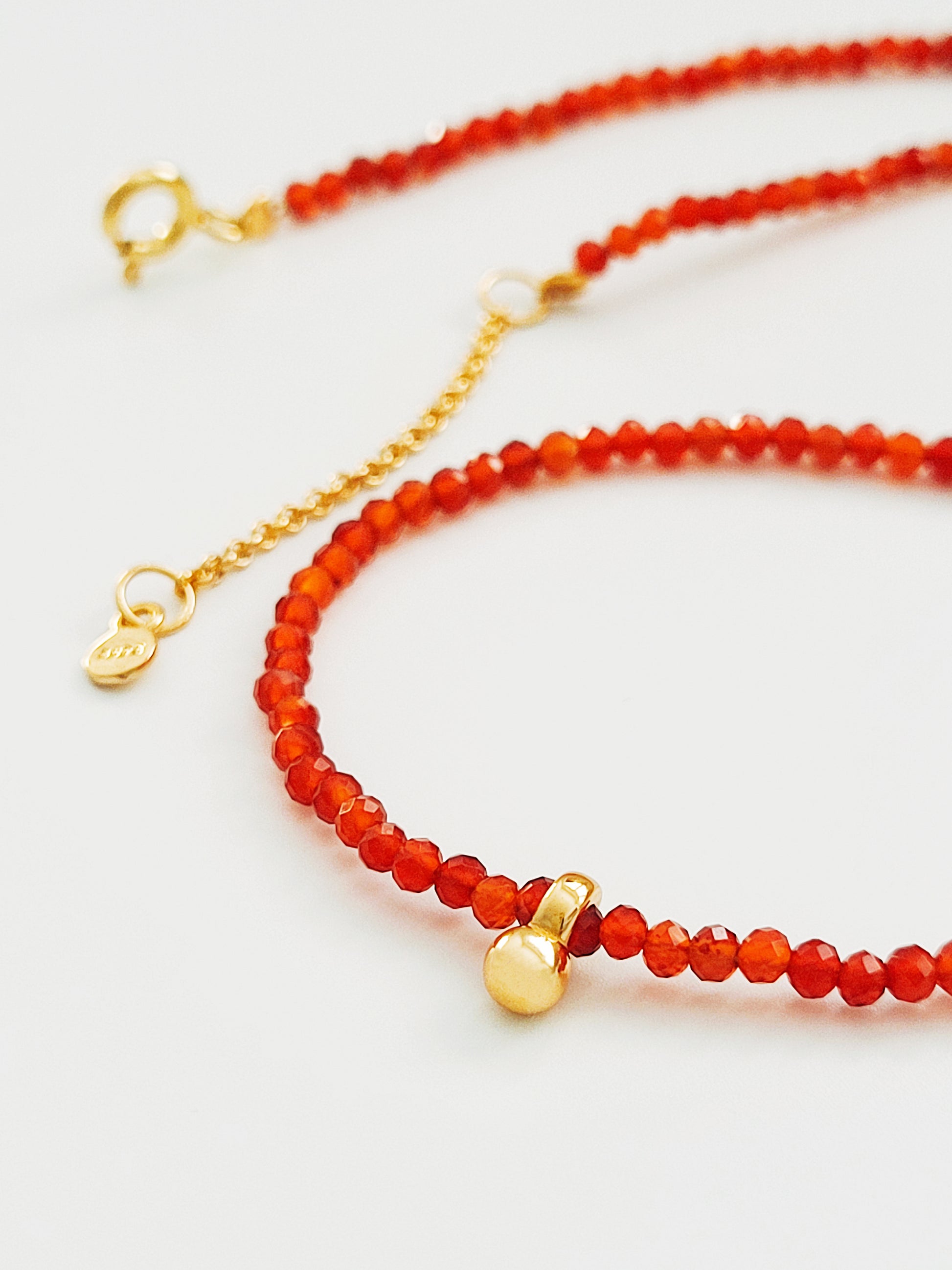 Dainty Red Agate Beaded Choker Necklace with a small gold charm, minimalist jewelry design. Valentines day gift for her.