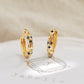 Dainty Sapphire Blue Star Huggie Earrings, crafted in gold plated sterling silver. Perfect for everyday wear, ideal gift for anniversaries and birthdays.