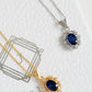 Two necklaces with blue gemstones on a white background, crafted in gold plated sterling silver.