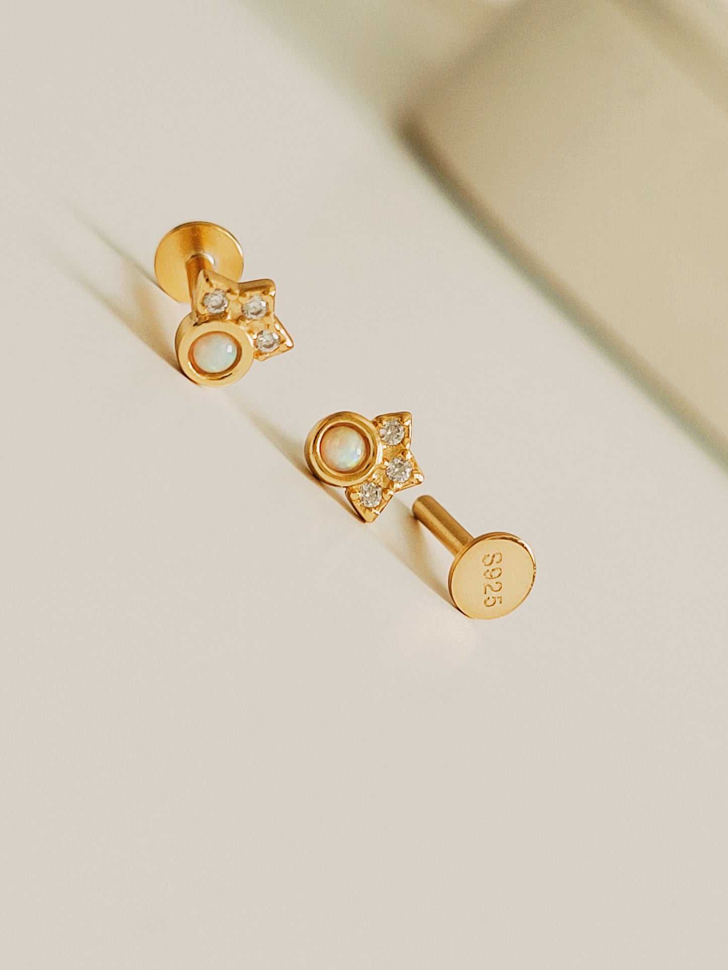 Dainty Crown Opal Stud Earrings with flat back closure for comfortable daily wear. Crafted in sterling silver with 18k gold plated and adorned with diamond accents.