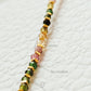 A minimalist gold bracelet with colorful tourmaline gemstone beads and gold plated beads, perfect for layering and stacking. Idea anniversary gift for her.