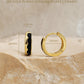 Gold-plated sterling silver hoop earrings with measurements on a beige stone background