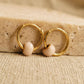 A pair of minimalist gold huggie earrings with white enamel charm, simple and cute earrings. Best gift for teen girl.
