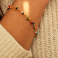 Colorful beaded gemstone bracelet on a girl's wrist, perfect chiristmas gift for her