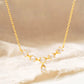 Minimalist 18k gold vermeil crown necklace with delicate crystals, ideal for weddings, anniversaries, and gifting.