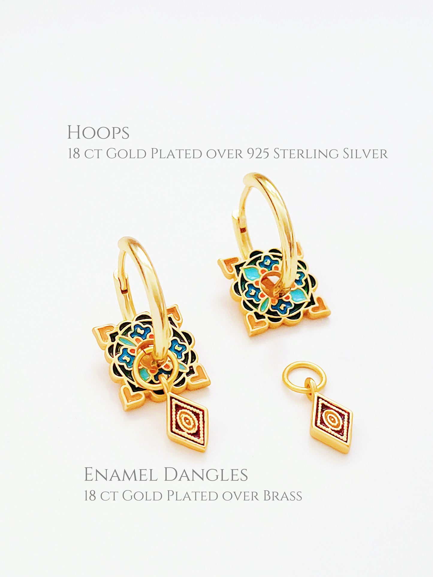 Artistic gold hoop earrings adorned with vibrant enamel tile motifs and small diamond-shaped pendants, perfect for a unique statement look.