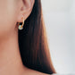 Chic jade hoop earrings with a pale green and gold finish jade gemstone, designed to complement a variety of fashion styles effortlessly.