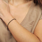 This dainty black onyx bracelet showcases tiny delicate black onyx gemstone beads, accented with 18k gold vermeil beads to blend geometric minimalism with natural beauty.