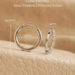A pair of  delicate 925 sterling silver huggie hoop earrings featuring sparkling clear cubic zirconia stones on a jewellery box, perfect birthday gift for her 