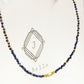 A delicate Lapis Lazuli beaded necklace featuring deep blue 2mm faceted gemstones and accented with 18k gold vermeil beads, styled as a minimalist choker necklace, perfect for gifting on birthdays, anniversaries, or special occasions.