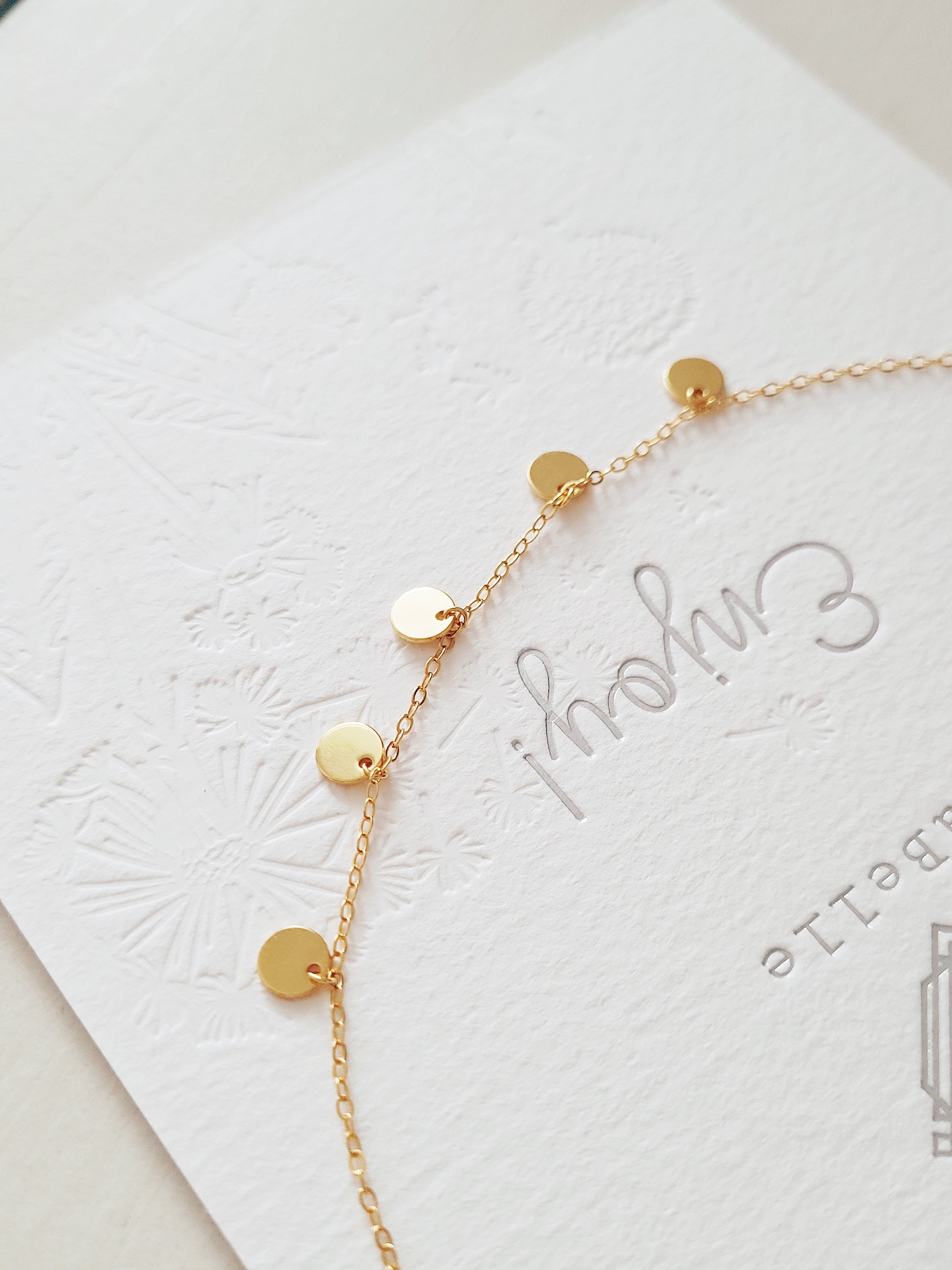 gold disc bracelet