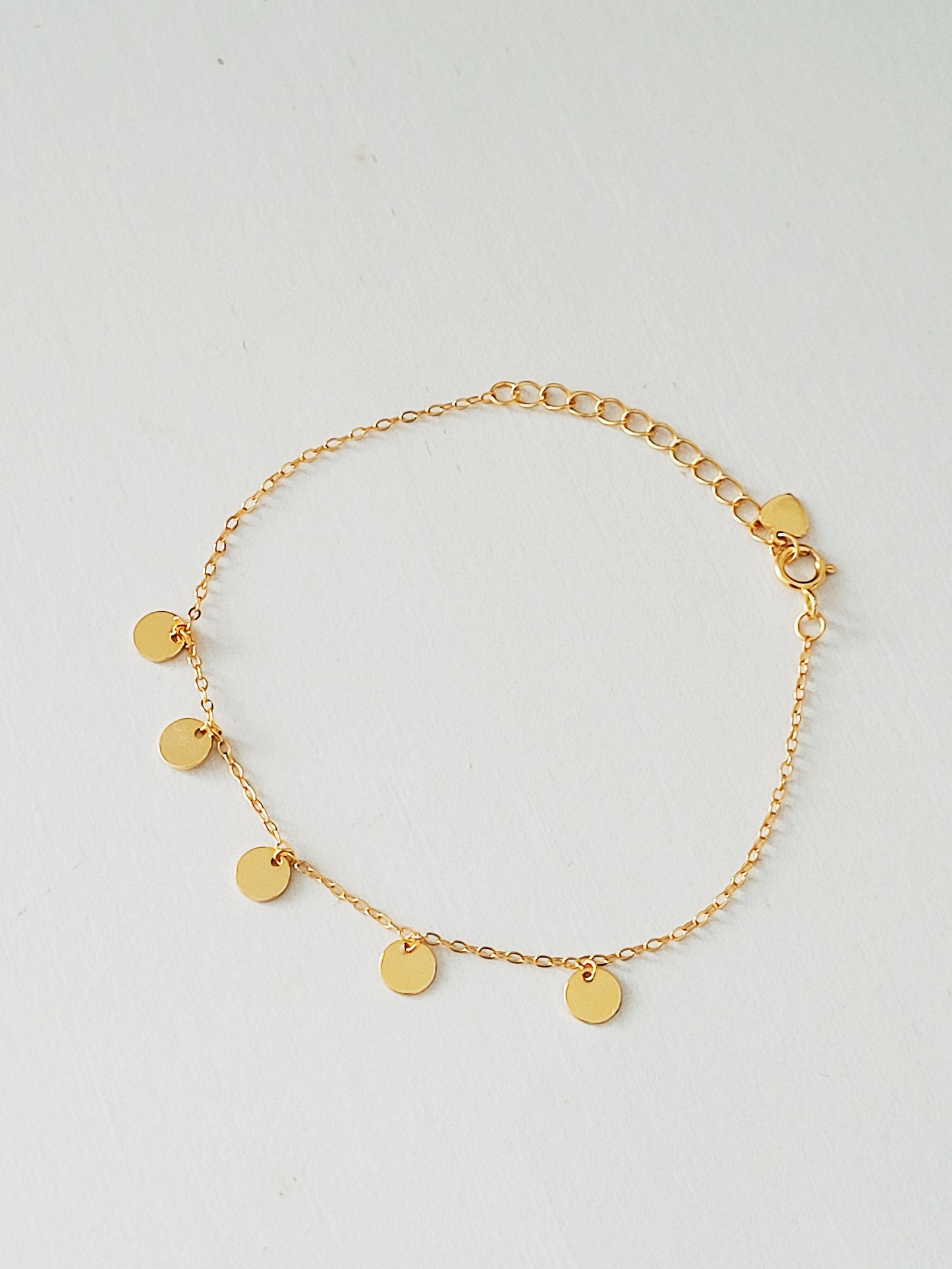 tiny disc bracelet