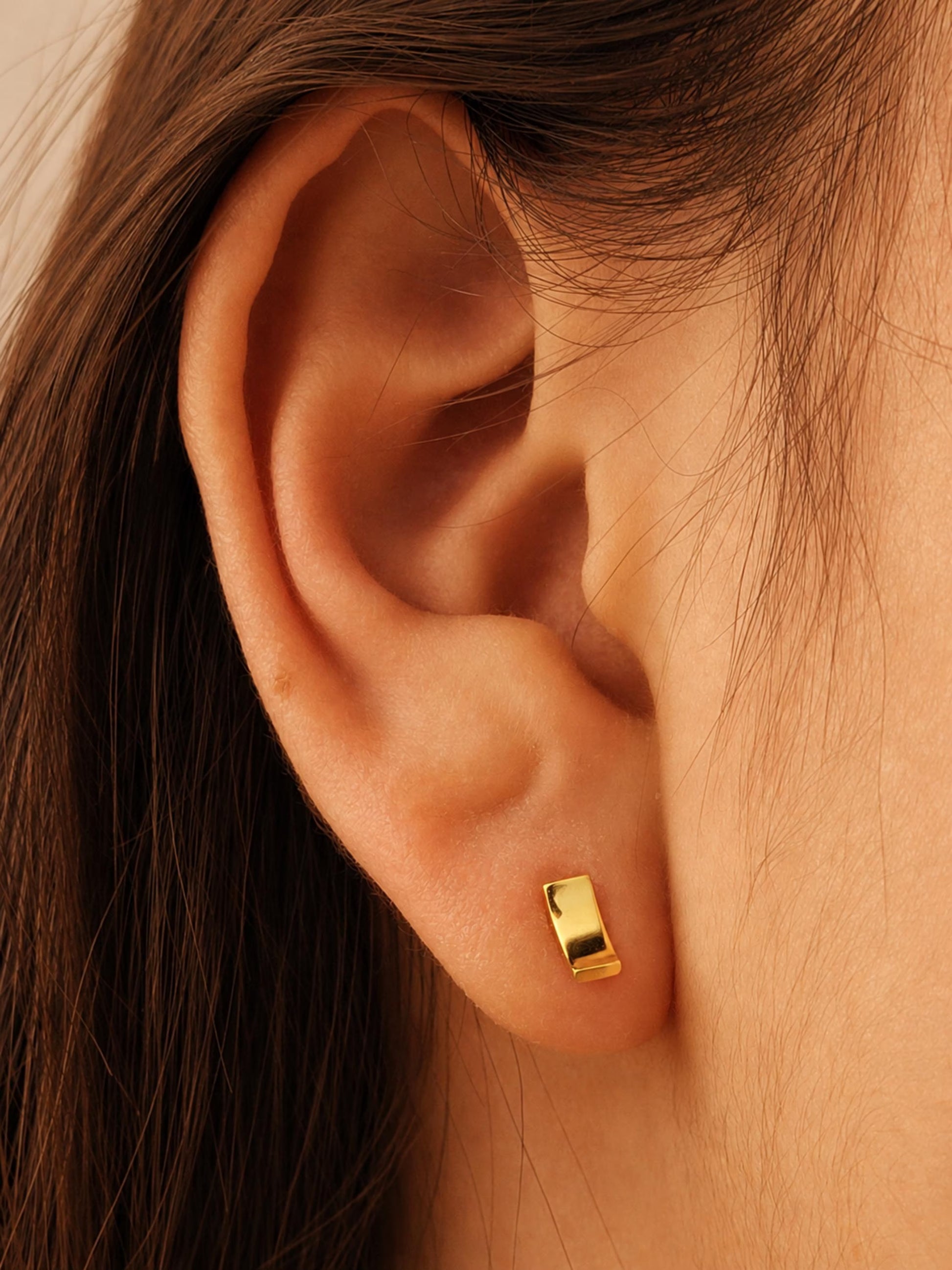 Minimal bar stud earrings crafted in gold plated 925 sterling silver worn, dainty gold rectangle stud earrings minimalist everyday jewellery
