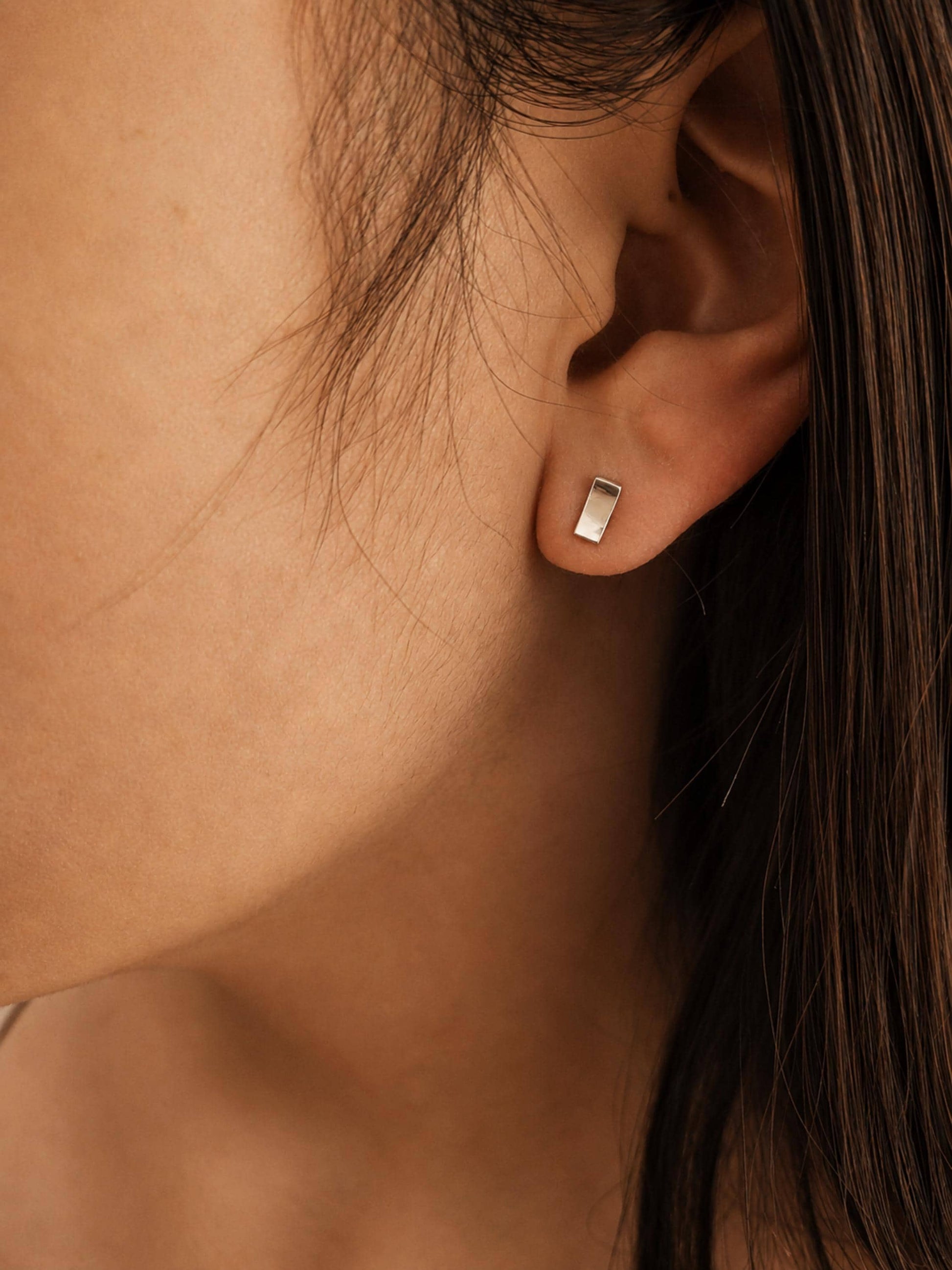 Minimal bar stud earrings crafted in 925 sterling silver worn, dainty gold rectangle stud earrings minimalist everyday jewellery