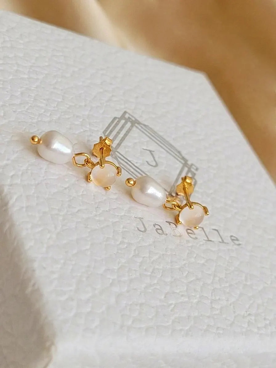 A pair of pearl drop earrings featuring moonstone gemstone on a JaBelle Jewellery box, perfect june birthstone jewellery gift for her.