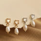 Set of Moonstone stud pearl drop earrings in gold vermeil and silver dainty bridal earrings on a beige background