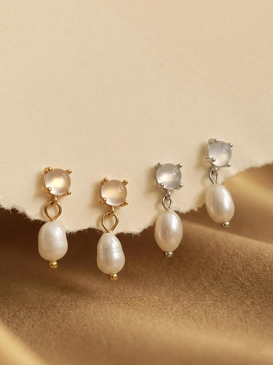 Set of Moonstone stud pearl drop earrings in gold vermeil and silver dainty bridal earrings on a beige background