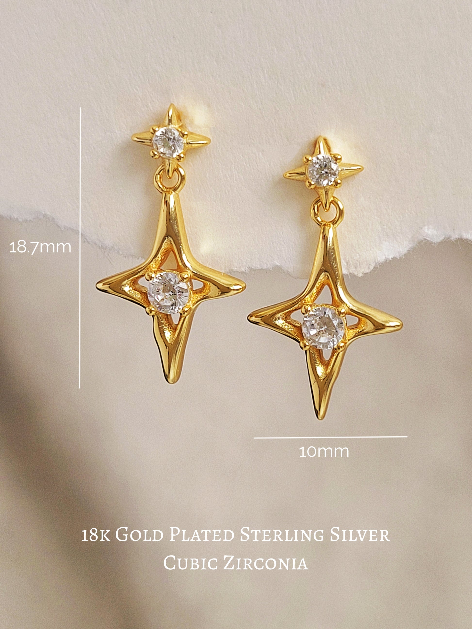 Dainty celestial inspired starburst earrings with a delicate gold-plated finish, perfect for everyday wear or as a thoughtful gift for her or astrology lovers.