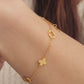A dainty gold bracelet featuring van cleef clover motif, crafted in gold plated sterling silver.