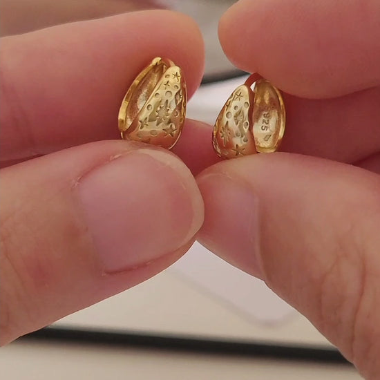 A pair of star huggie hoop earrings crafted in 18k gold plated sterling silver, perfect christmas gift for her